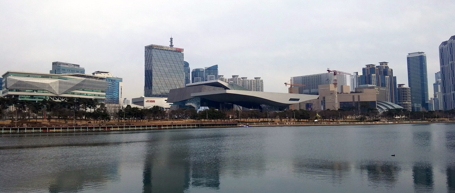 South Korea, Busan: Centum City, from the right river bank of the Suyeong river.